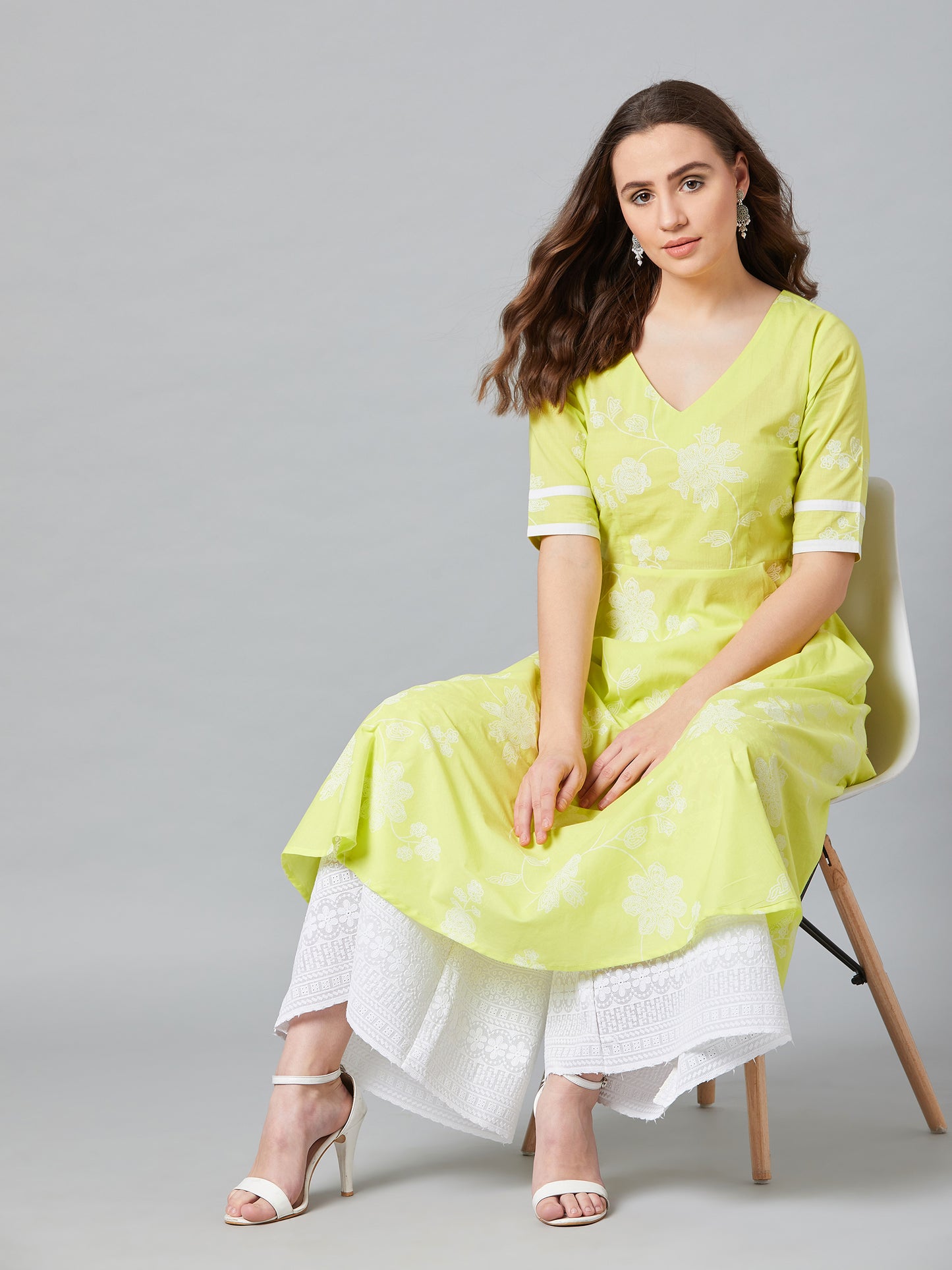 Women Flared Kurta And Palazzo Set
