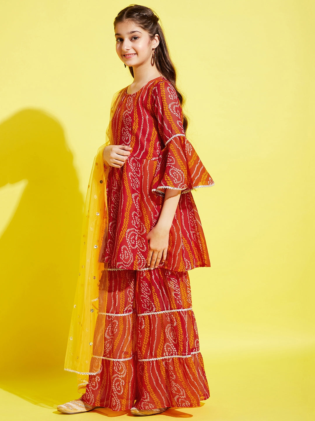 Girls Orange Bandhani Printed Empire Kurta with Sharara & Dupatta