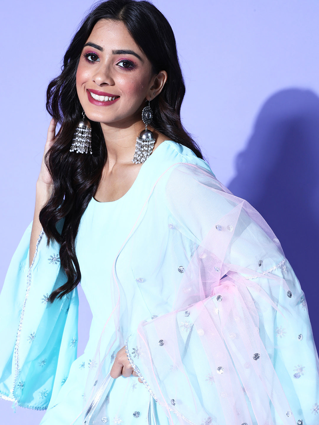 Embroidered baby blue kurta and baby pink sharara with matching embroidered dupatta