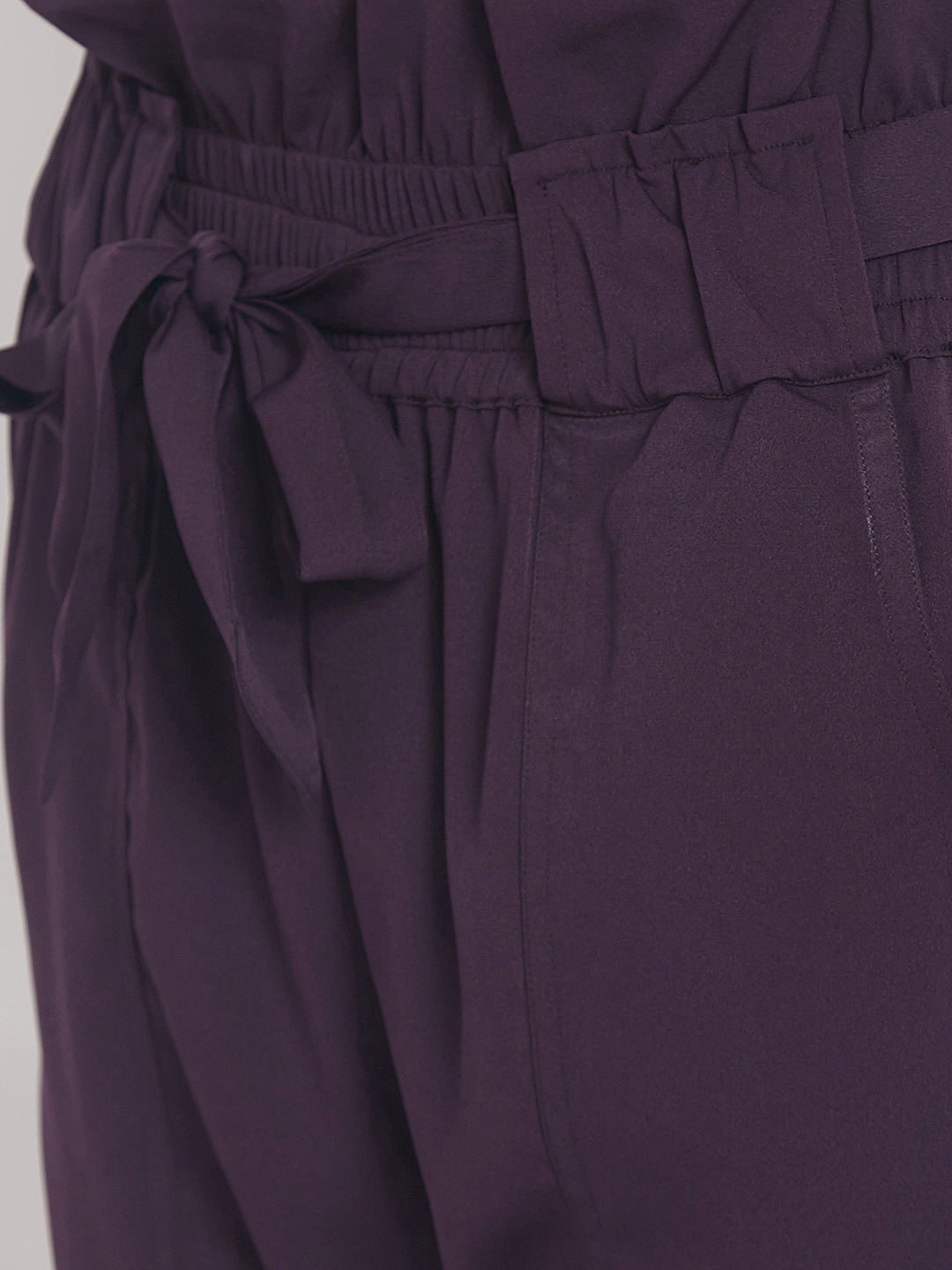 Women's solid plum pleated high waist trouser