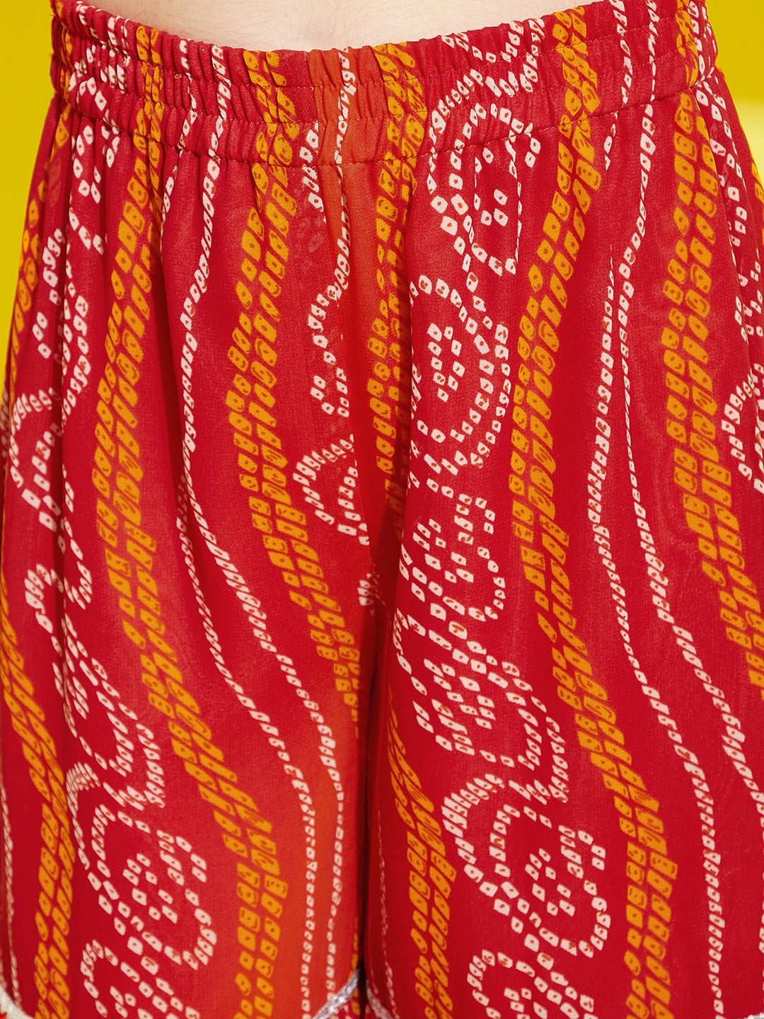 Girls Orange Bandhani Printed Empire Kurta with Sharara & Dupatta