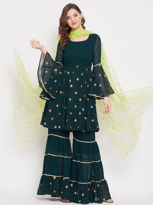 Dark green sharara set with green dupatta, overall gota lace detailing
