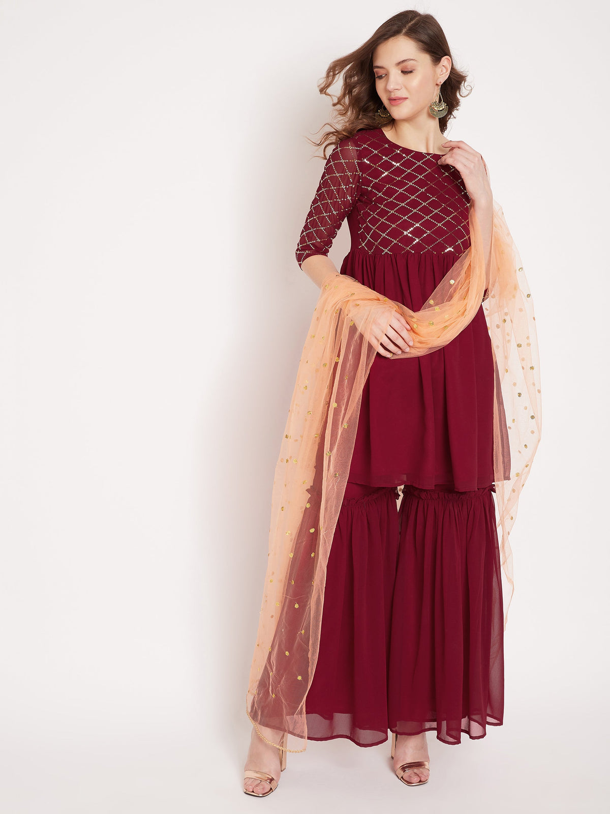 Maronn yoke and sleeve jaal embroidered sharara set with peach dupatta