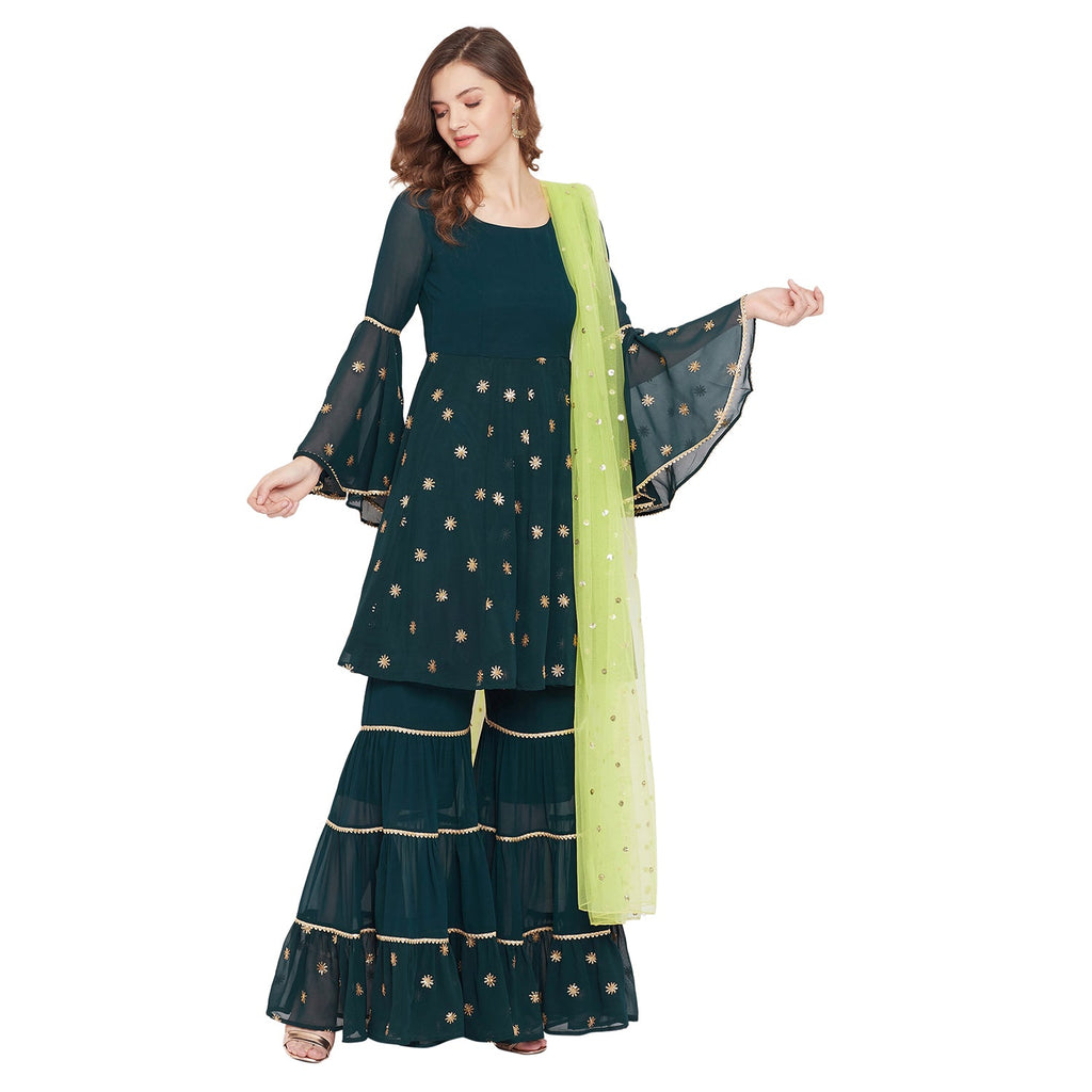 Dark green sharara set with green dupatta, overall gota lace detailing