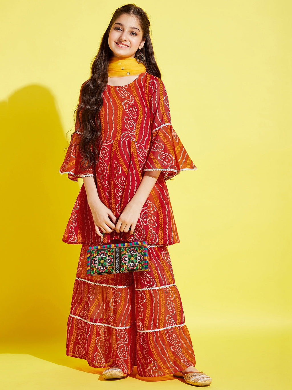Girls Orange Bandhani Printed Empire Kurta with Sharara & Dupatta