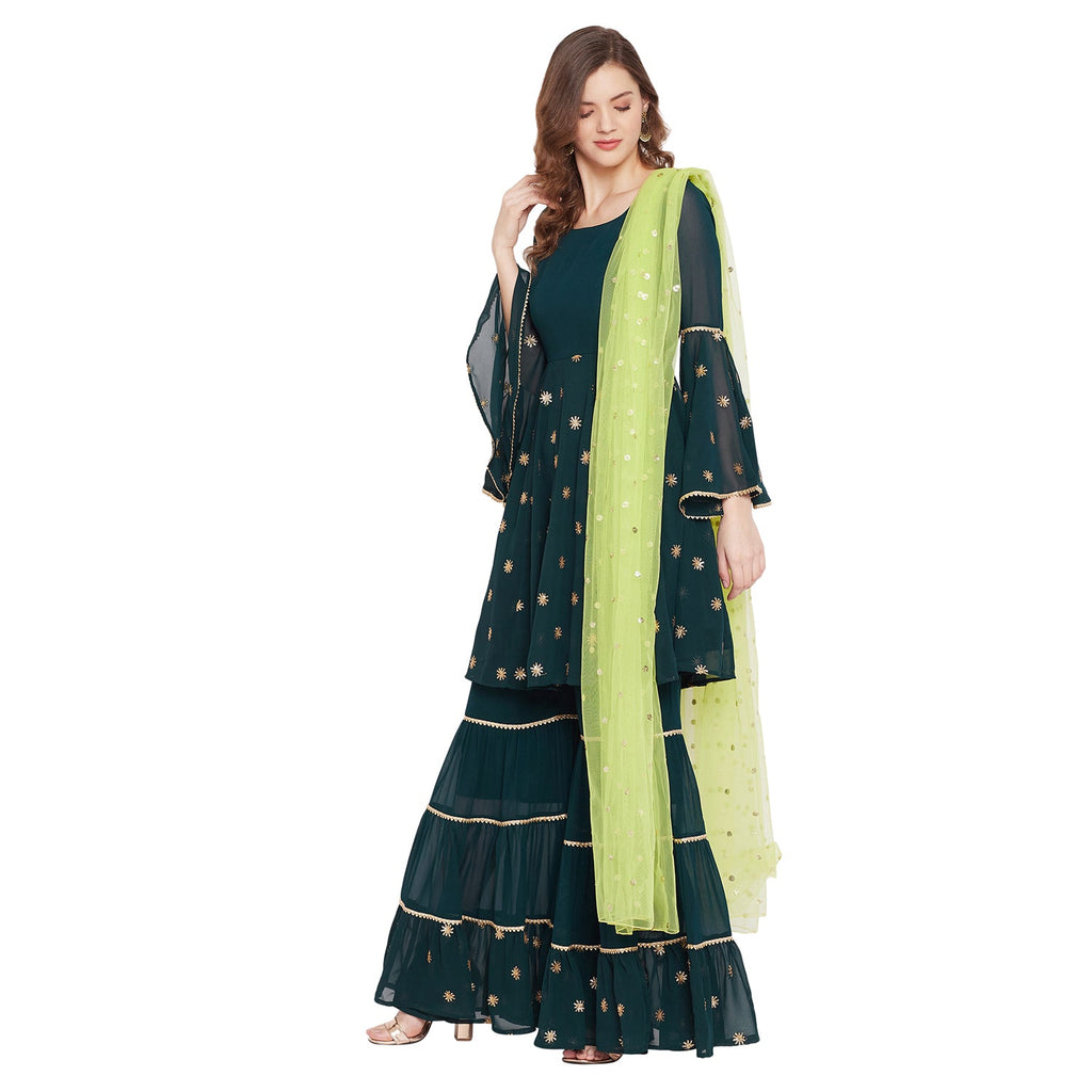 Dark green sharara set with green dupatta, overall gota lace detailing