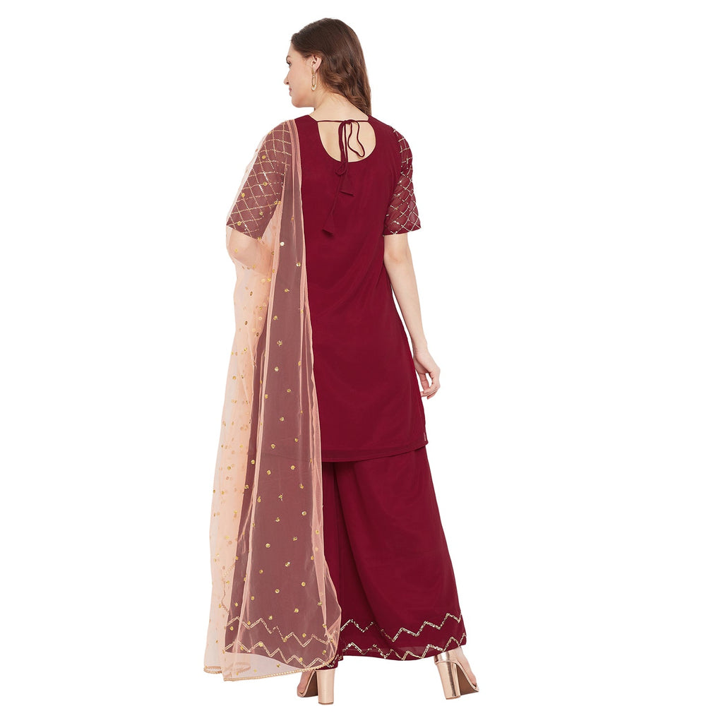 Maroon jaal embroidered kurta and sharara with peach dupatta