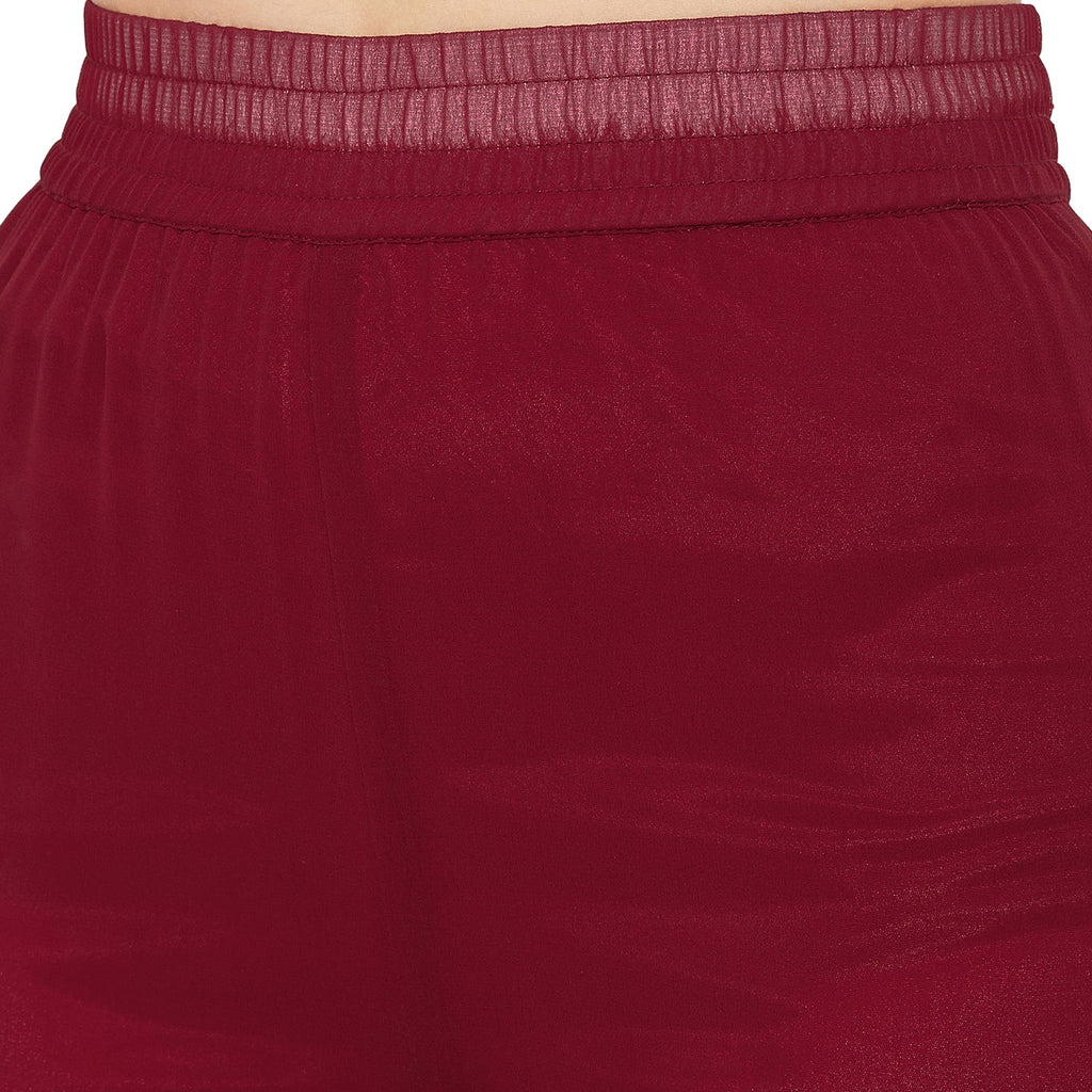 Maroon sharara set with peach dupatta, overall gota lace detailing