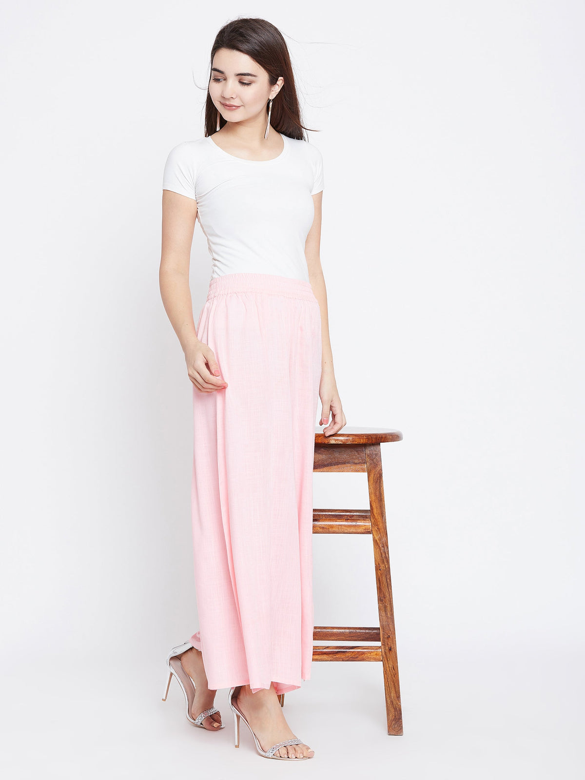 Women Pink Relaxed Flared Solid Parallel Trousers